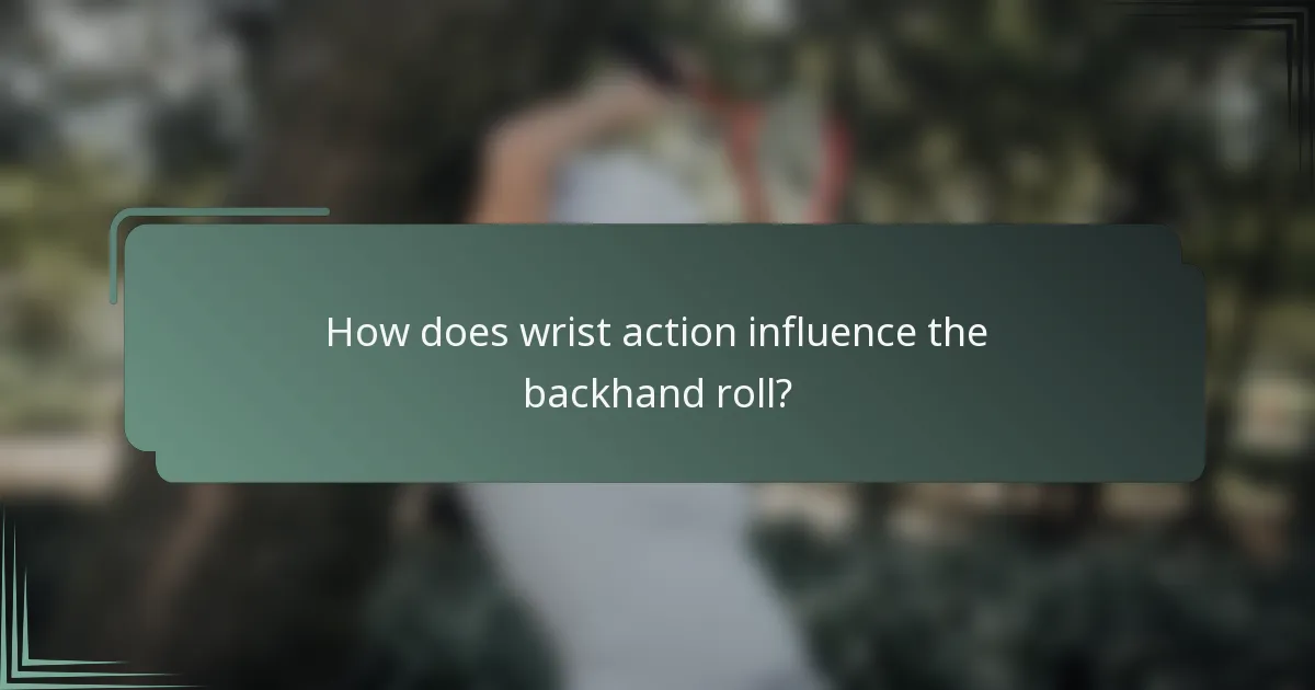 How does wrist action influence the backhand roll?
